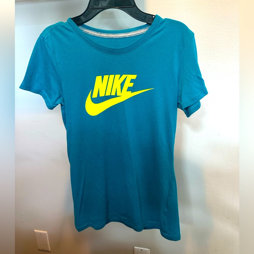 Nike blue and yellow women’s athletic tee shirt, slim fit, size small